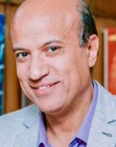 الكاتب الصحفى حسين الزناتى