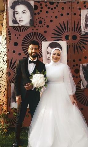 العروسين أحمد طارق وأمل على