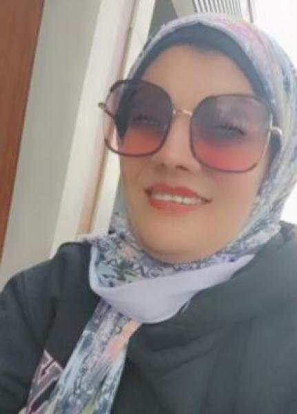 الكاتبة منى نور الدين
