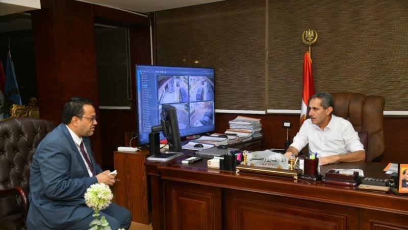 د. طارق رحمى وناصر حسن