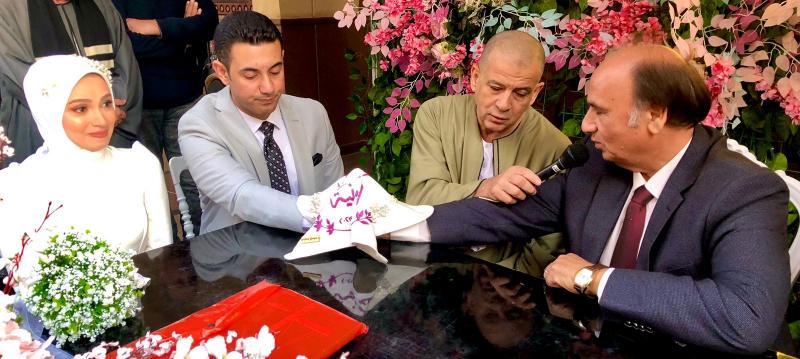 ..عقد قران د- أحمد وعروسته الجميلة د- أمنية