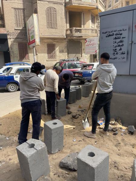 رحمى يتابع رصف وتطوير شارع النحاس