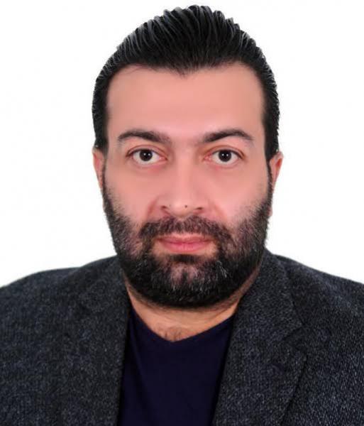 الكاتب العراقى د. علي عزيز أمين