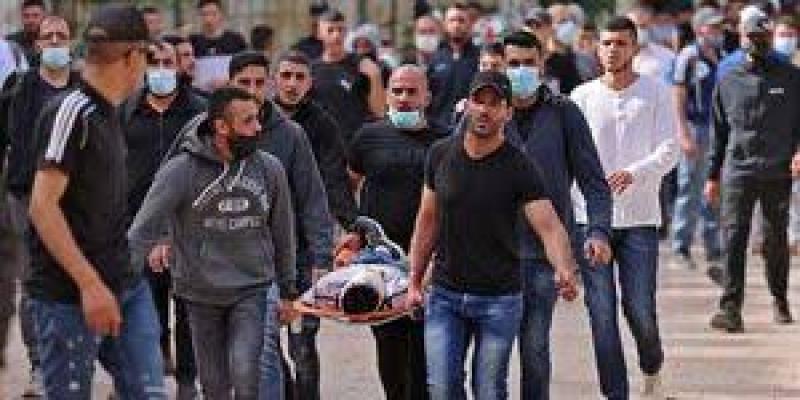 جرحى فلسطينيين في الشوارع ارشيفية 
